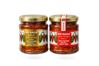 Two jars of Mr Naga hot pepper flakes with labels on a white background