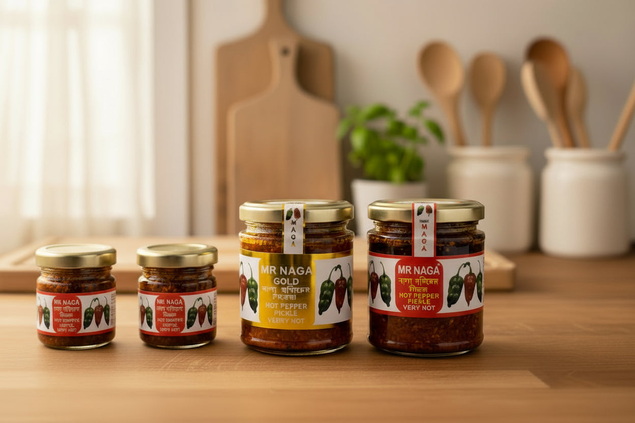 Four jars of various Mr Naga ghost pepper pickle, kitchen background