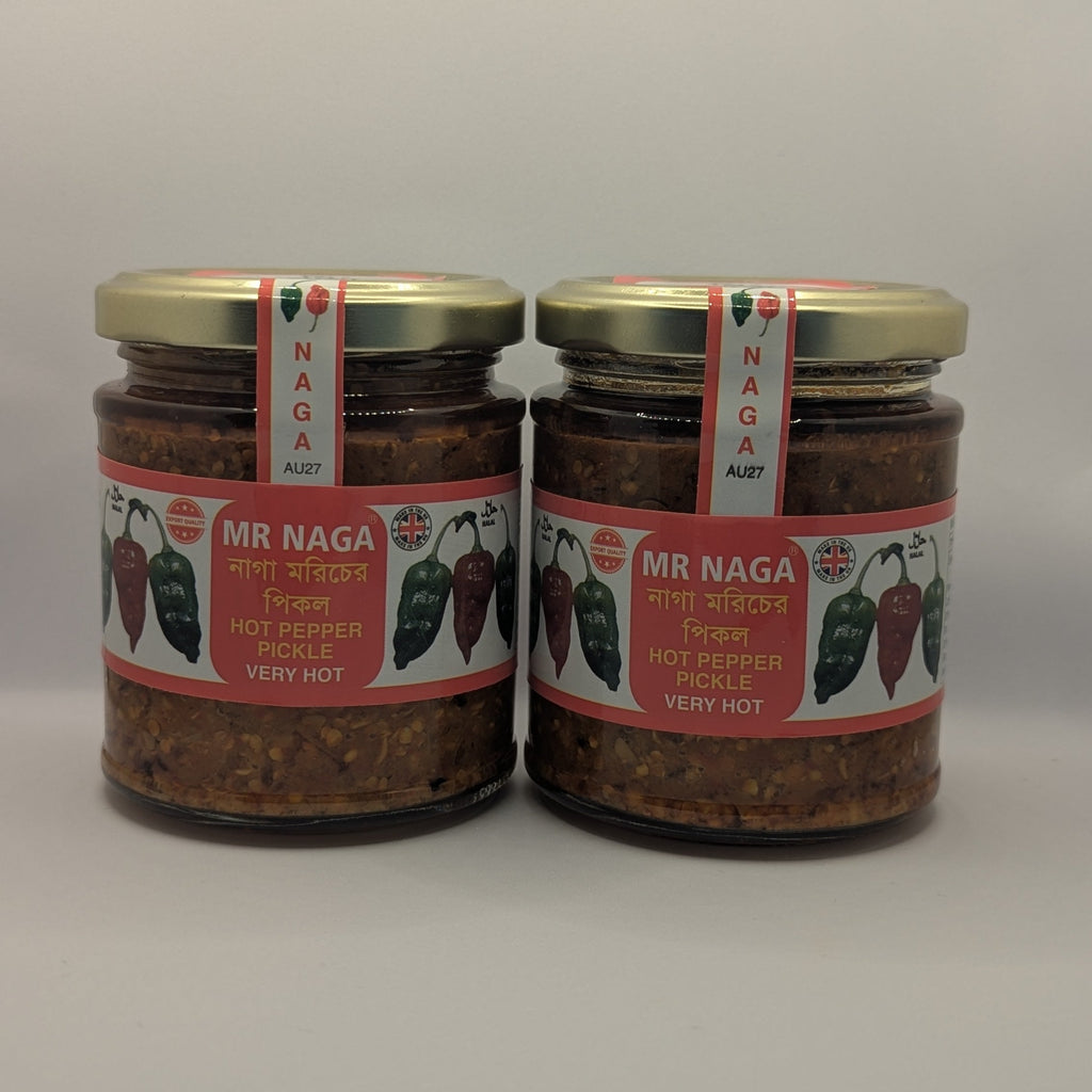 Two jars of 'Mr Naga' hot chilli pepper paste on a white background