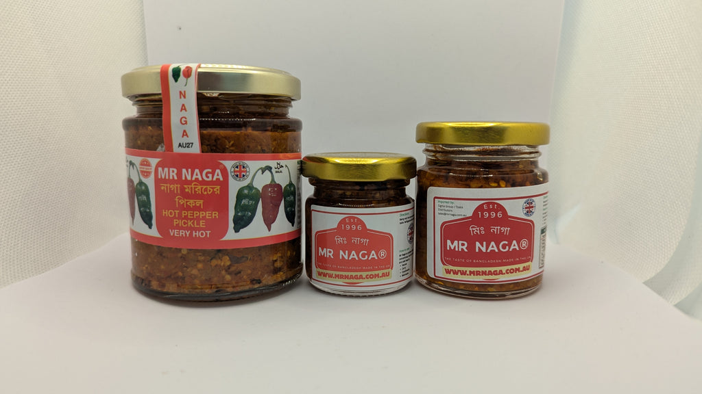 Three jars of Mr Naga hot sauce on a white background