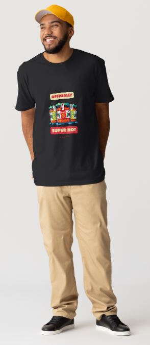 Man wearing a black t-shirt with colorful graphics and text, beige pants, and a yellow cap on a white background